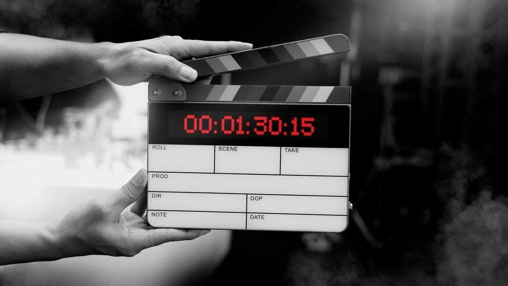 Digital,Film,Slate,For,Filmmaker,In,Set.,Hand,Hitting,Timecode