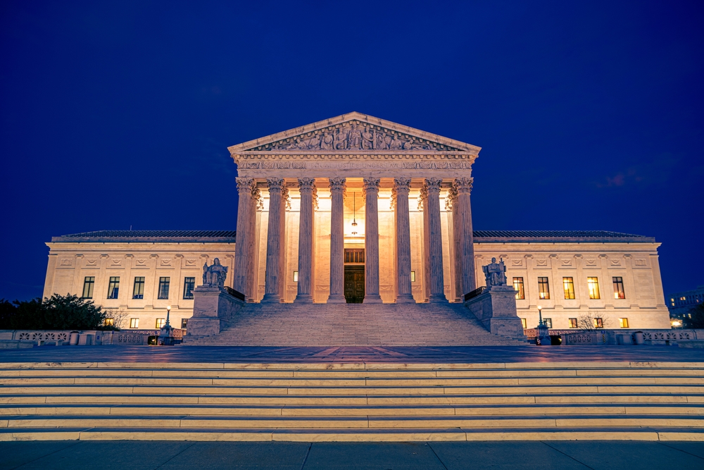 United,States,Supreme,Courts,Building,Illuminated,At,Night,In,Washington