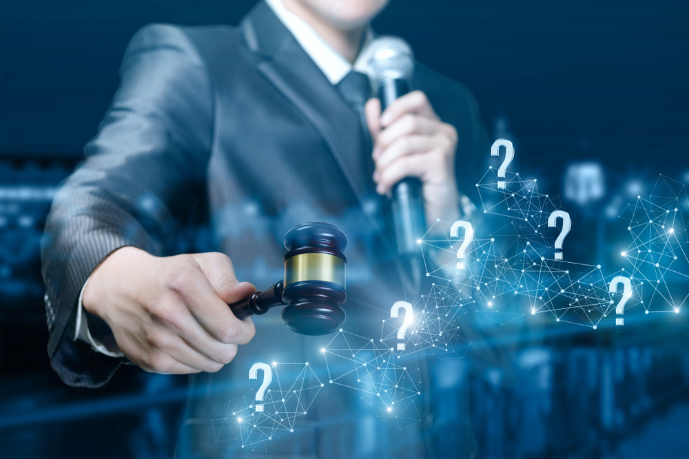 Questions,And,Answers,During,The,Auction.,An,Auctioneer,With,A