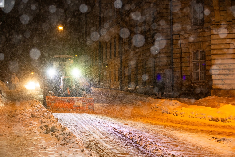 Snowplow,Tractor,Clearing,Streets,During,Winter,Blizzard,In,Lviv