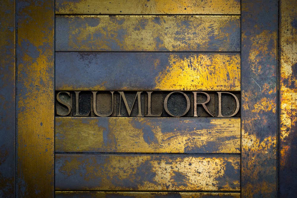 Photo,Of,Real,Authentic,Typeset,Letters,Forming,Slumlord,Text,On