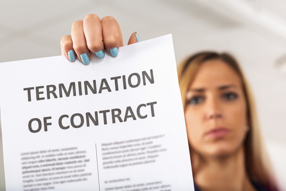 Woman,In,Her,20s,Or,30s,Holds,A,Job,Termination