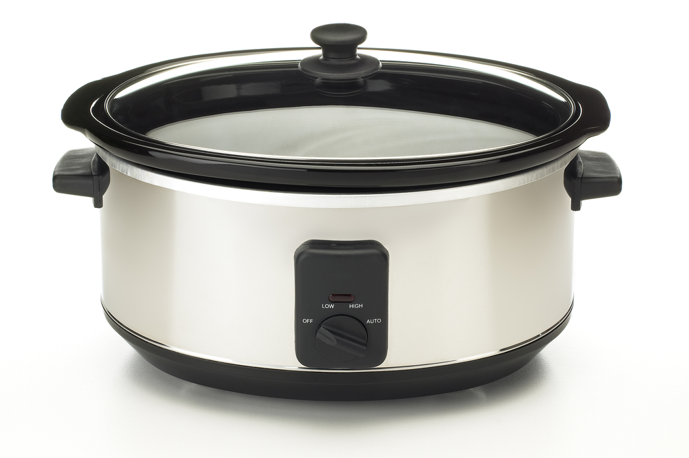 Closeup,Of,Electric,Crock,Pot,On,White,Background