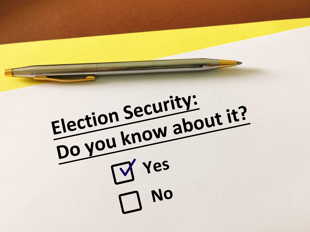 One,Person,Is,Answering,Question.,He,Knows,About,Election,Security.