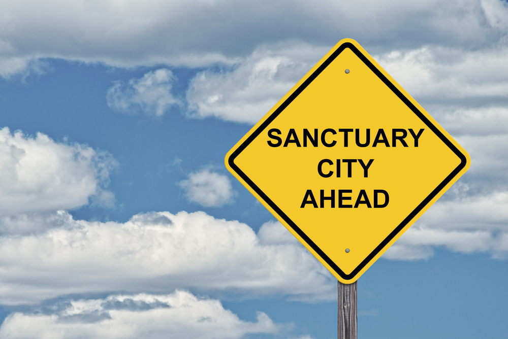 Jared Polis Turned Colorado Into a Sanctuary State and Now the Bill Came Due