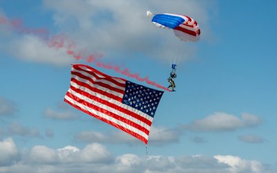 Skydiver Carrying American Flag Slams Into Virginia Tech Scoreboard and Hangs Above Stunned Crowd