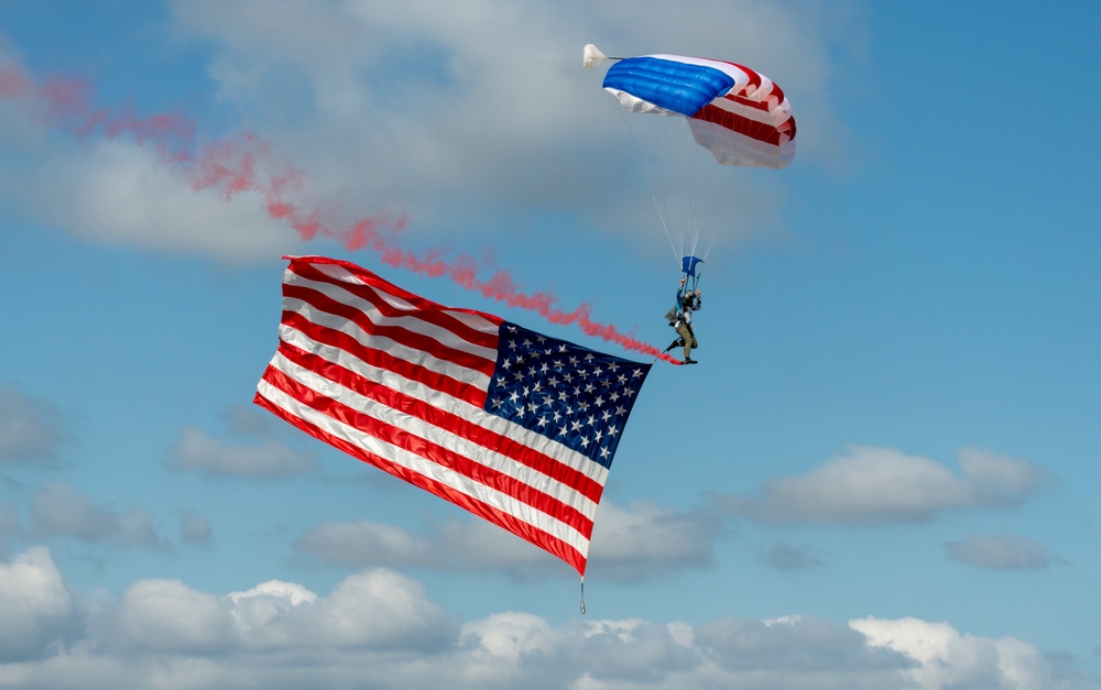Skydiver Carrying American Flag Slams Into Virginia Tech Scoreboard and Hangs Above Stunned Crowd