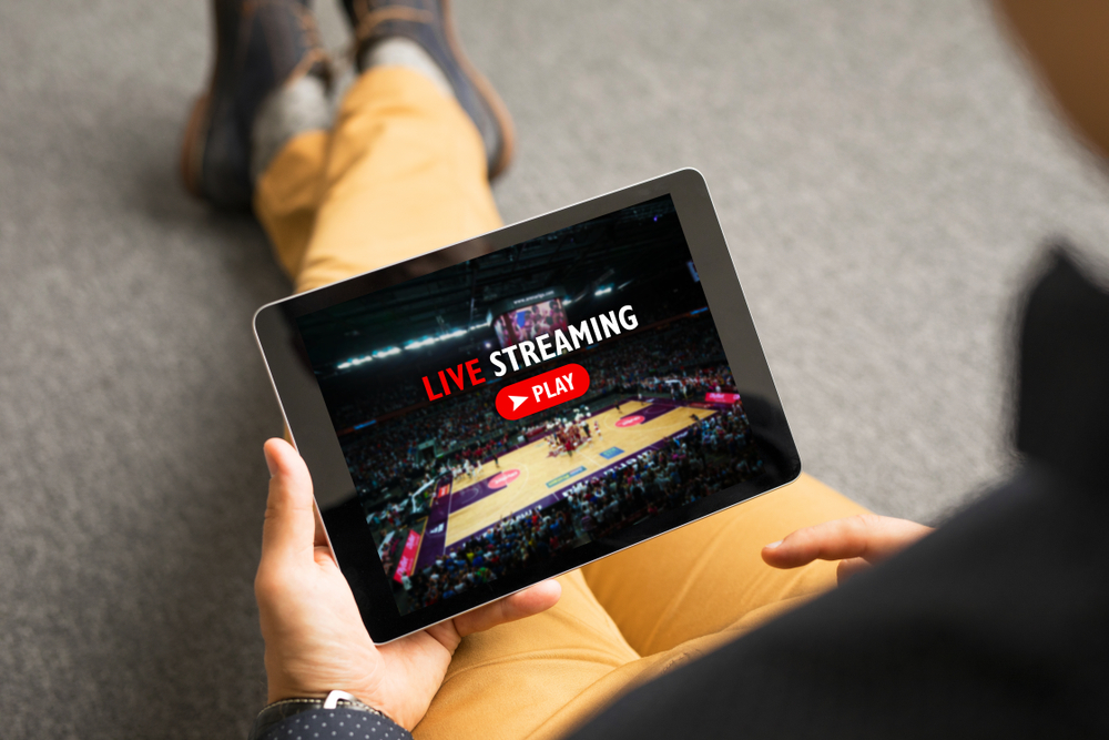 Man,Watching,Sports,On,Live,Streaming,Online,Service