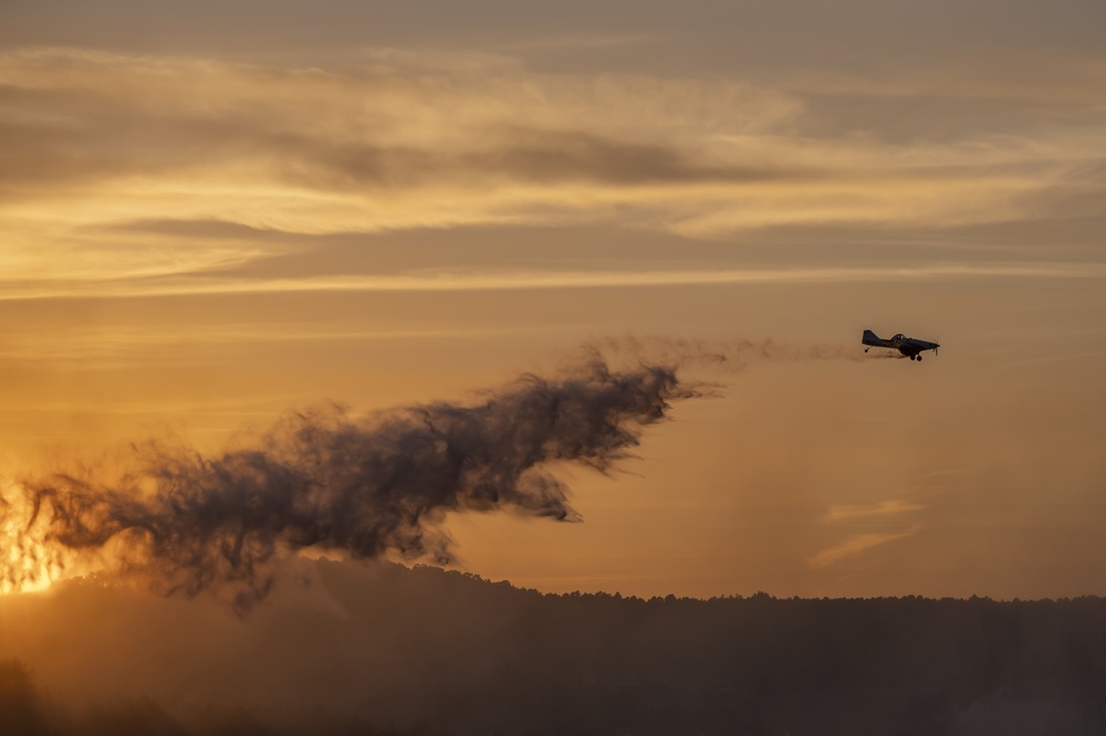 Light,Aircraft,Dropping,Water,Onto,A,Wildfire,In,Ourense,,Galicia,